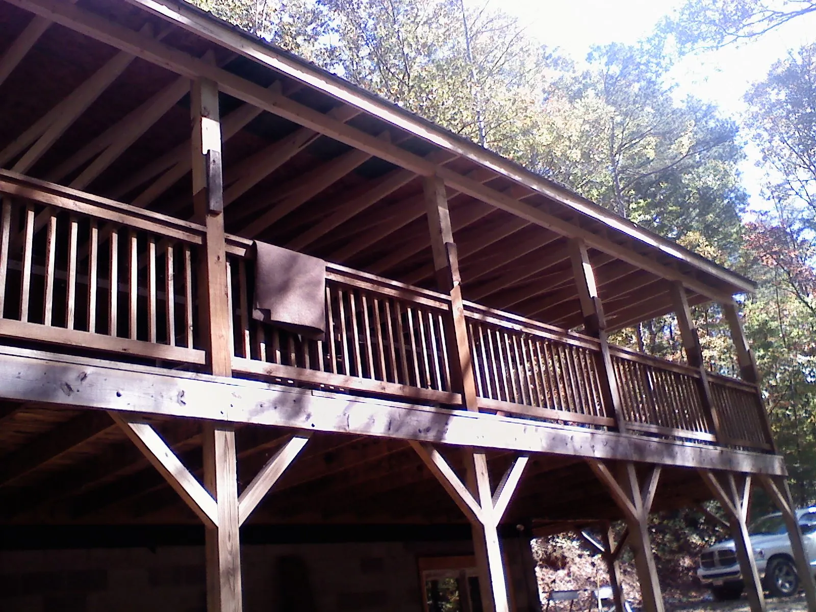 Timber framing under a new elevated porch and deck — Roof Leak Repair in Banner Elk by Roofing Brothers